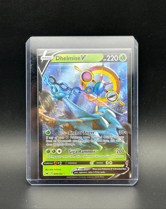 Pokémon trading card featuring Dhelmise v in clear protective case on a dark background