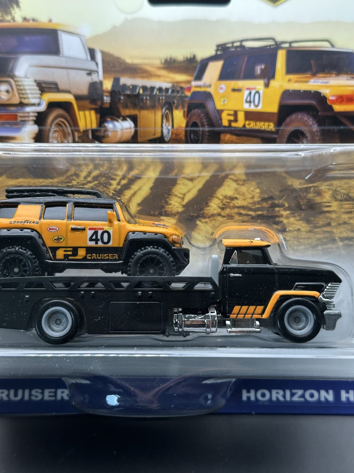 HOT WHEELS - TOYOTA FJ CRUISER HORIZON HAULER (2025) - TEAM TRANSPORT 81