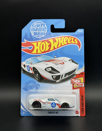Hot Wheels packaging featuring a Ford GT-40 model on a dark background