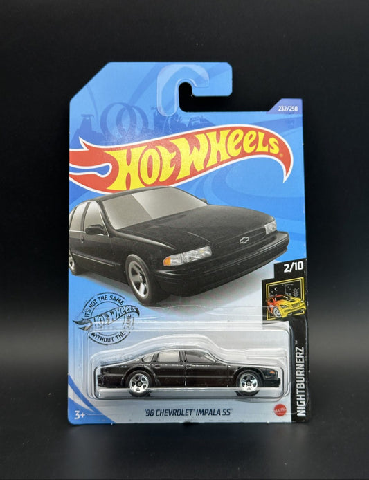 Hot Wheels '96 Chevrolet Impala SS toy car in packaging on a black background