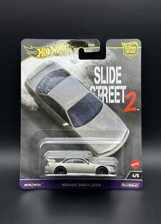 Hot Wheels Slide Street 2 toy car packaging on a dark background