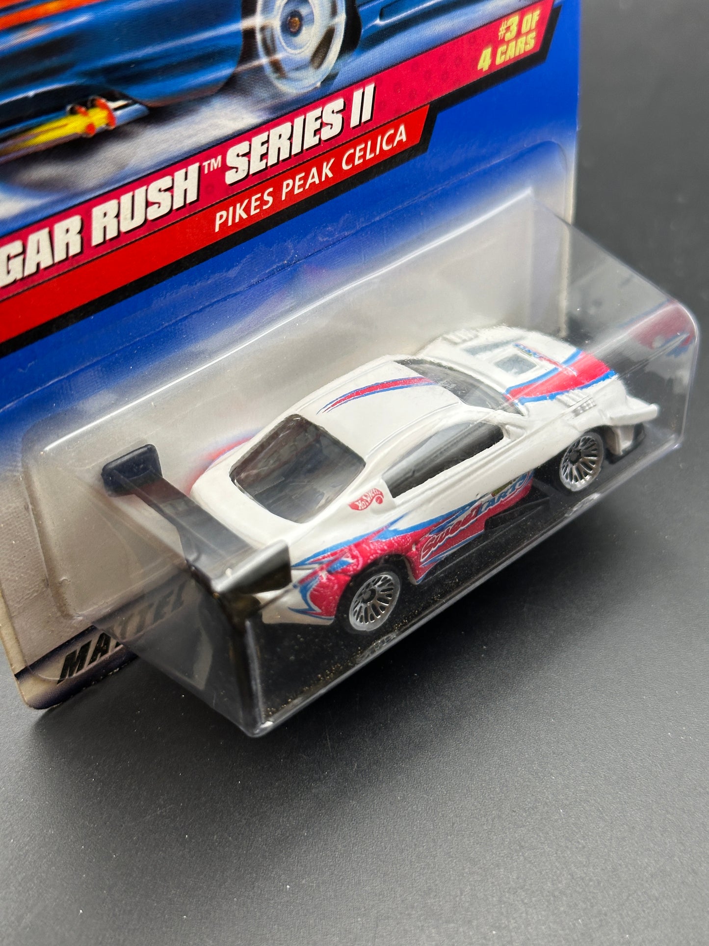 HOT WHEELS - PIKES PEAK CELICA (1999) - HW SUGAR RUSH SERIES II 3/4