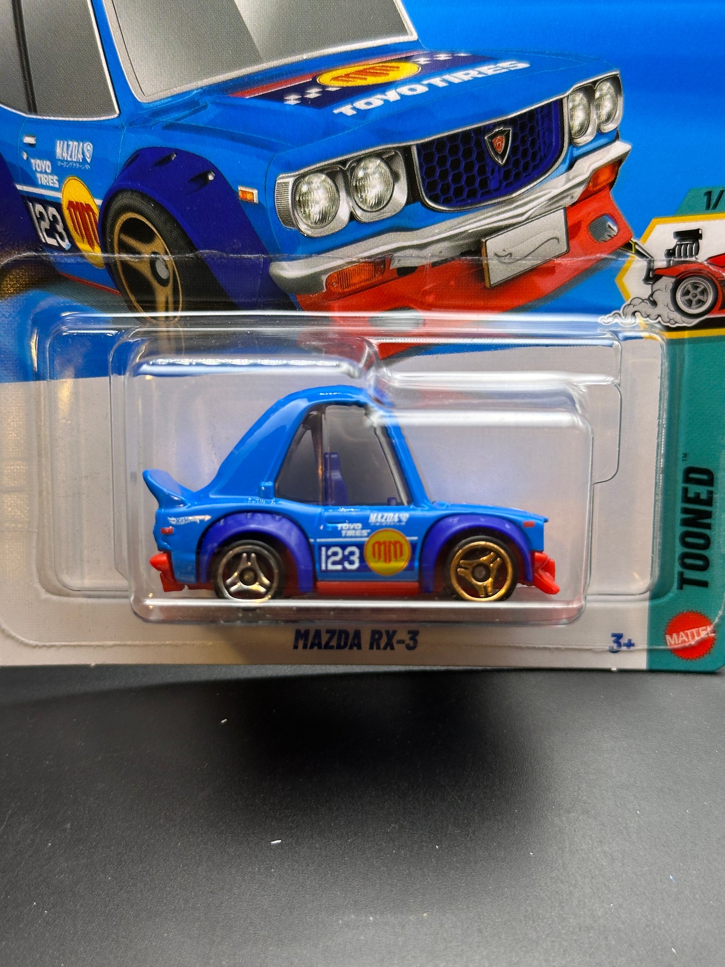 HOT WHEELS - MAZDA RX3 (2026) - MAD MIKE - HW TOONED 1/5