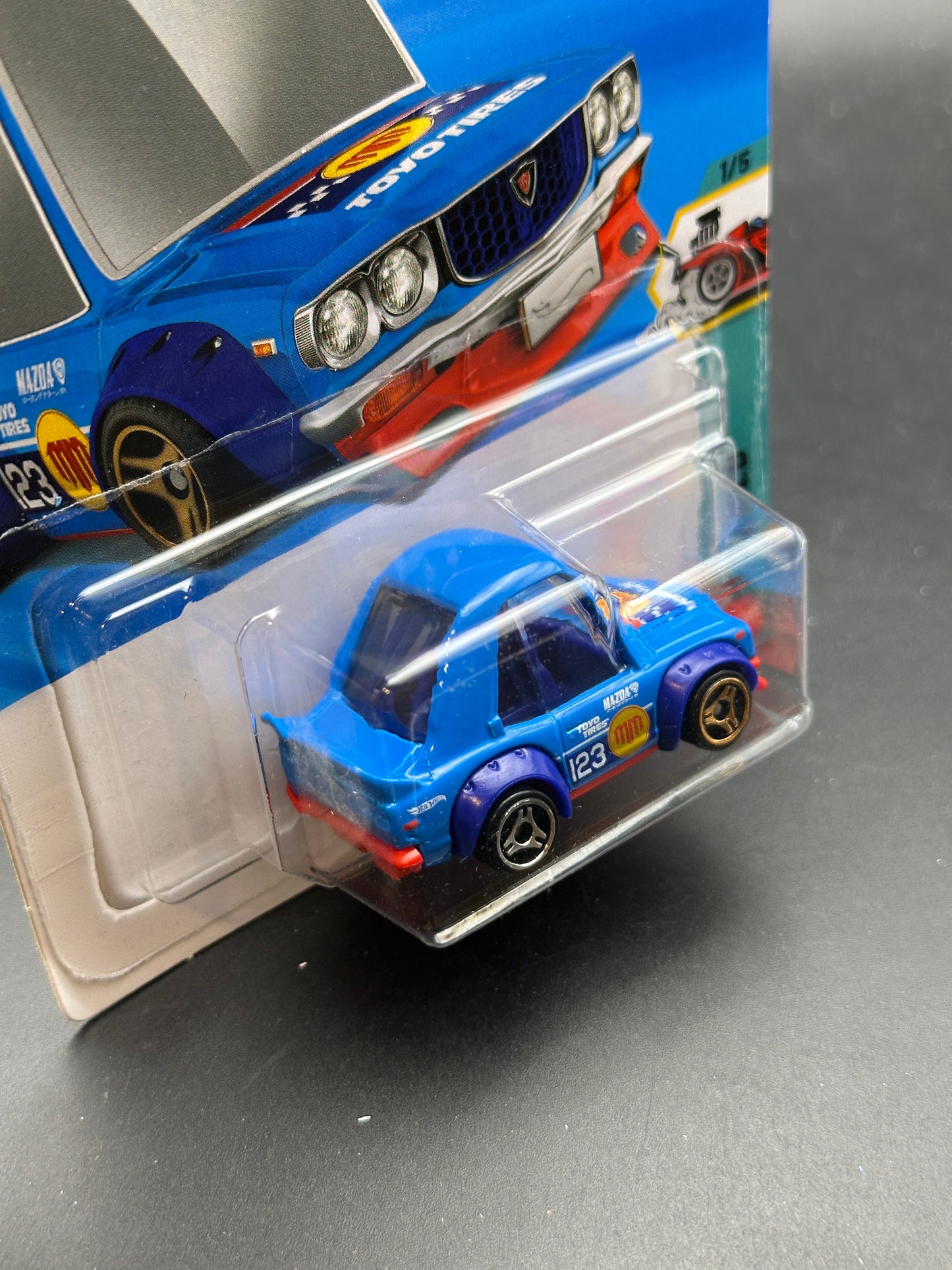 HOT WHEELS - MAZDA RX3 (2026) - MAD MIKE - HW TOONED 1/5