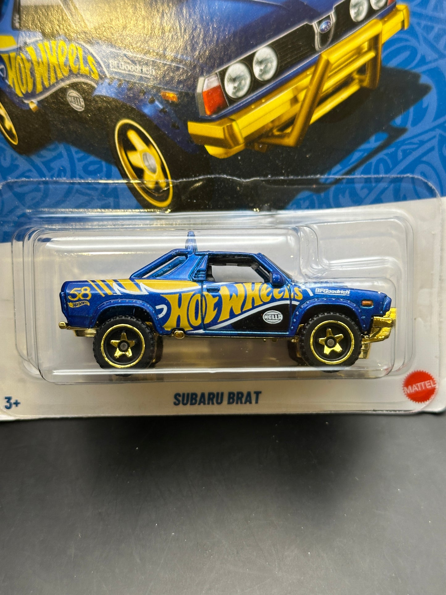 HOT WHEELS - SUBARU BRAT (2026) - ANNIVERSARY BLUE & GOLD SERIES 5/6