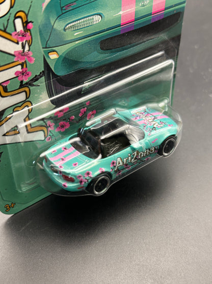 HOT WHEELS - 1991 MAZDA MX5 MIATA (2026) - ARIZONA TEA - 7-ELEVEN EXCLUSIVE