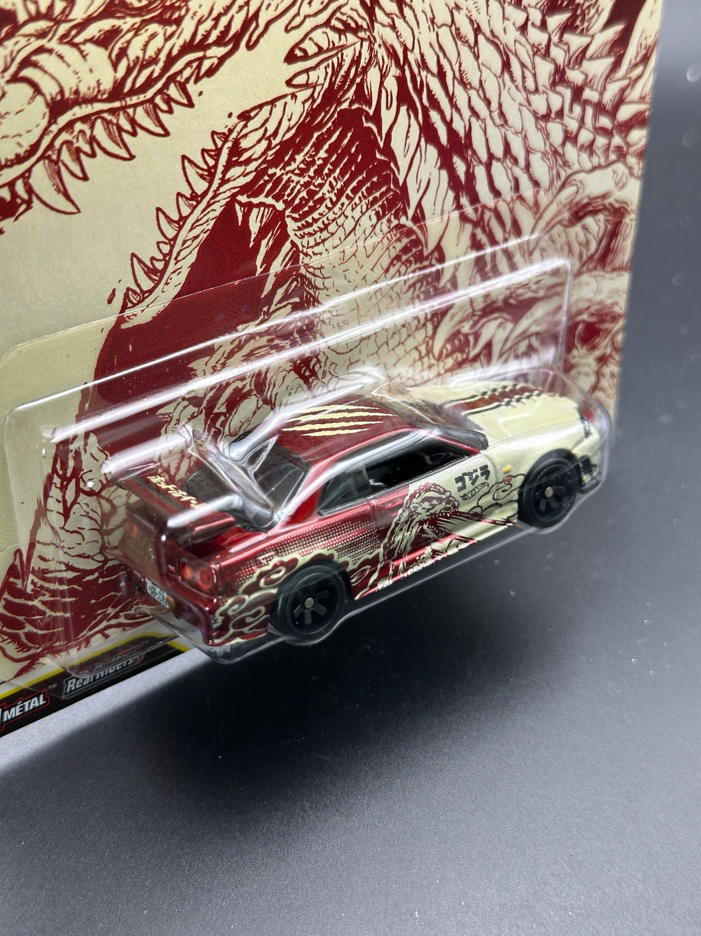 HOT WHEELS - NISSAN SKYLINE GT-R (BNR34) (2026) - GODZILLA - POP CULTURE